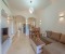 Living room with dining table and kitchen