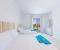 Bedroom with commode and mirror