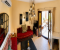 Oriental living room with small working desk and access to the large balcony
