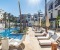 Sun loungers and umbrellas by the pool
