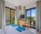 Bedroom 2 with balcony to the laggon side