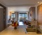 View from the kitchen to the living room and balcony