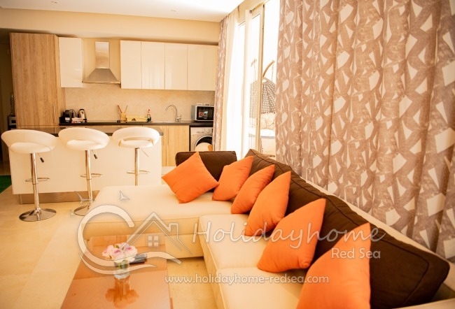 Living room with a view of the kitchen