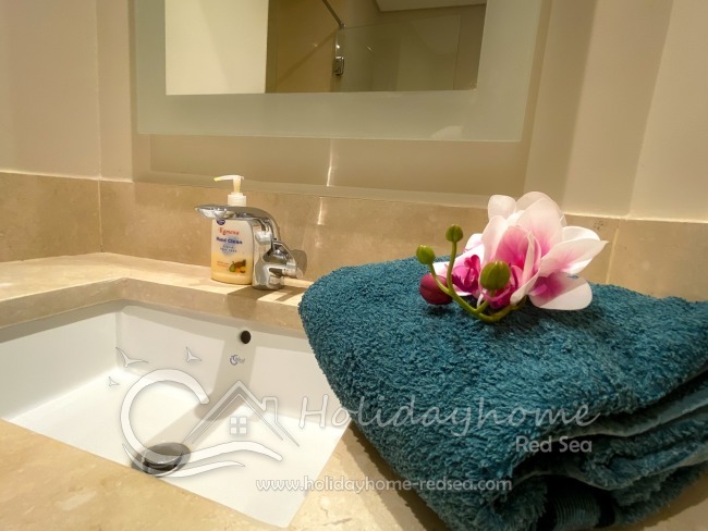 Bathroom with large mirror