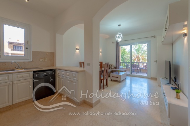 Kitchen with access to the living room