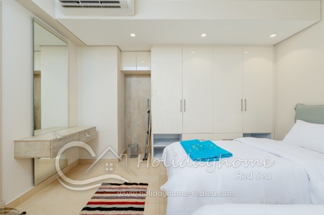 Bedroom 2 with two single beds