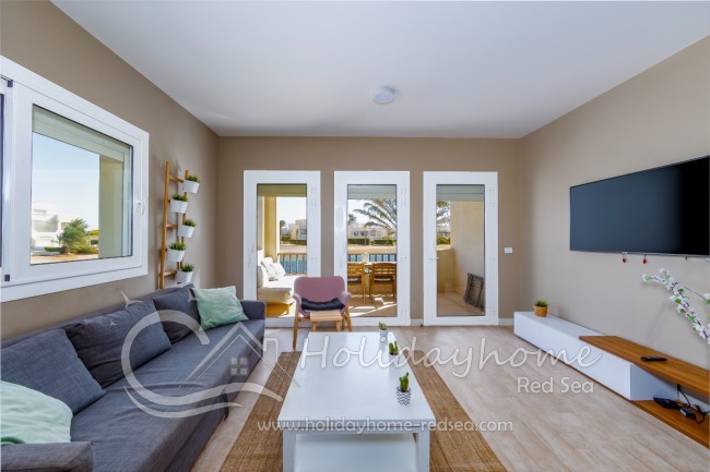 Living room with sleeping couch and smart TV