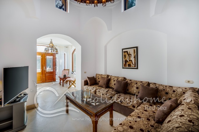 Large living room with access to the terrace and private pool