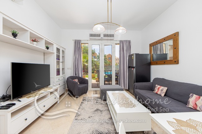 Cozy living room with nice terrace. 