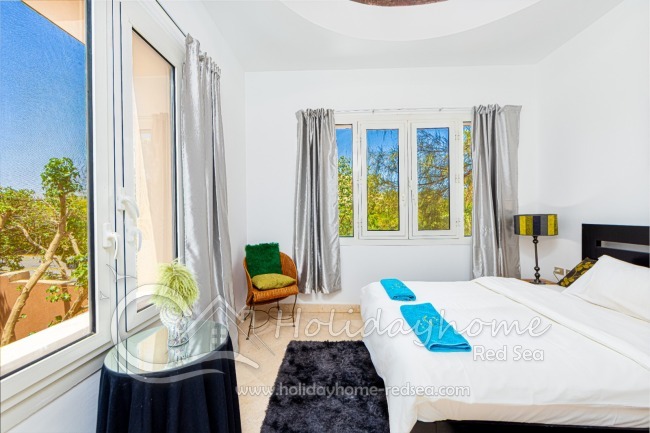 2. bedroom with cozy sitting area. 