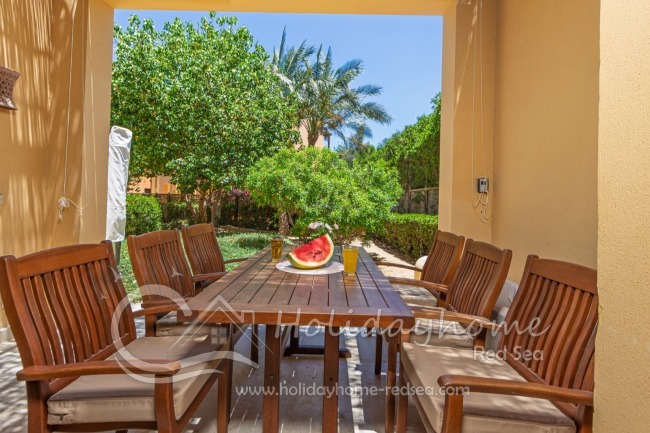 Beutiful terrace with dining table and chairs