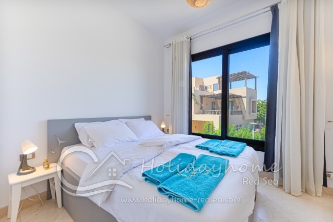 Master bedroom with large double bed (1.8 m wide)