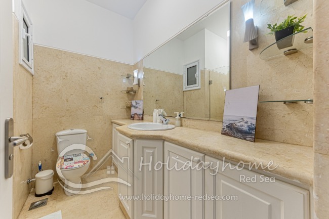 Bathroom 2 with a large mirror.