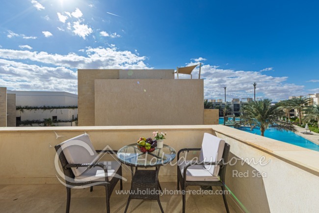 Large balcony with pool view