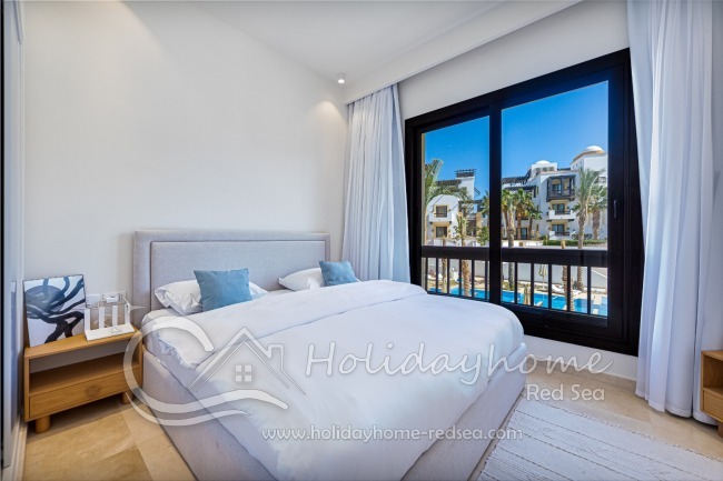 Bedroom 2 with also lovely pool view