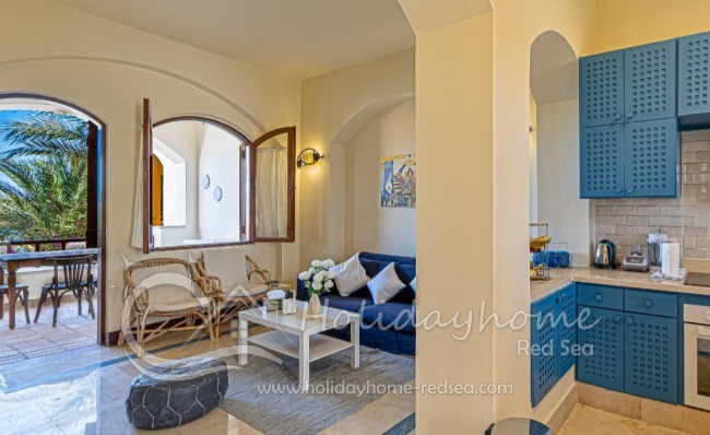 Open kitchen with living room and large balcony