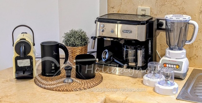 Coffee machine by De'Longhi, espresso capsule machine, blender, and a milk frother