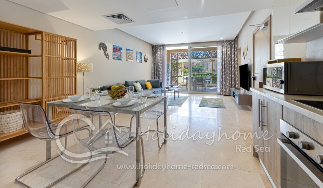Bright living room with dining area and kitchen