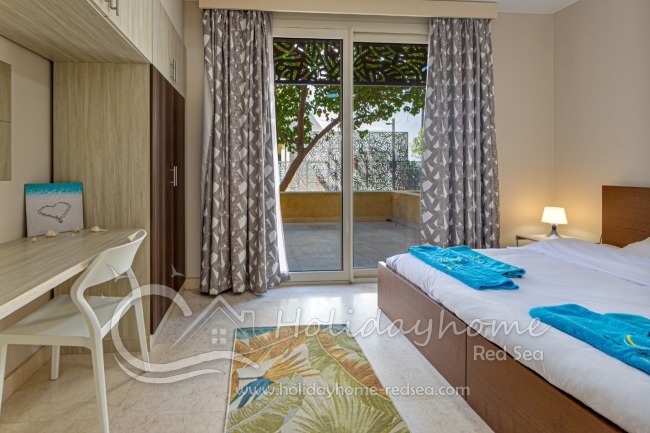 Bedroom with workspace