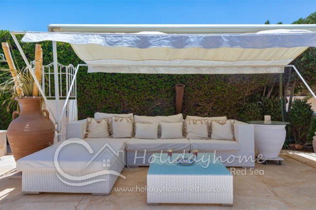 Cozy lounge with a sunshade roof